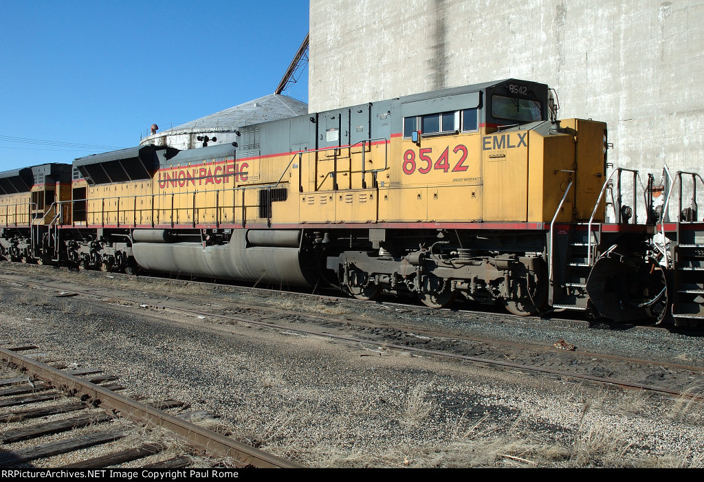 EMLX 8542, EMD SD90MAC-H, in storage on the KCS